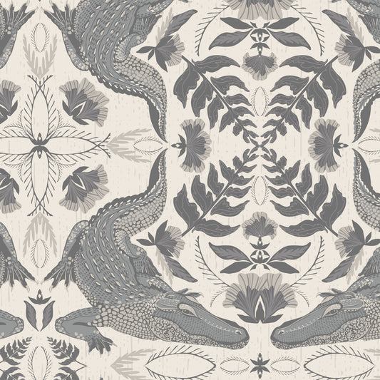 Patterned fabric with crocodile and leaf design on a neutral background