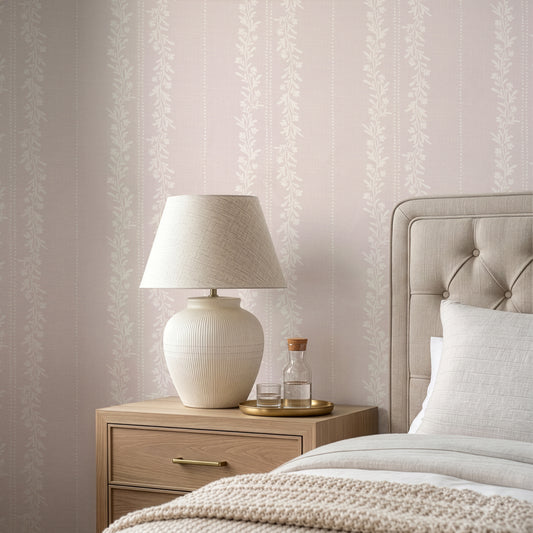 Timeless Florals Wallpaper in Blush shown  in a bedroom.