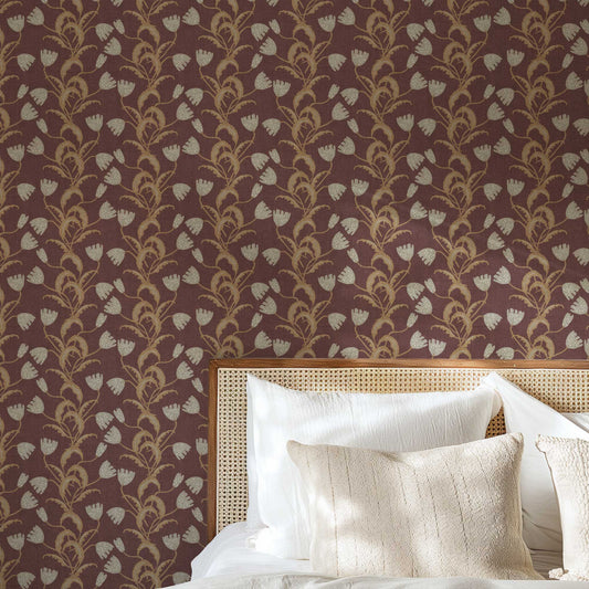 Modern Tulips Wallpaper in Burgundy shown in a bedroom