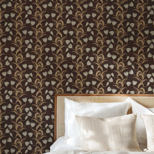 Modern Tulips Wallpaper in Espresso shown in a bedroom