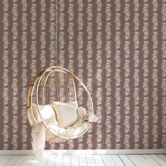 Vining Berries Wallpaper in Old Burgundy shown in a reading room