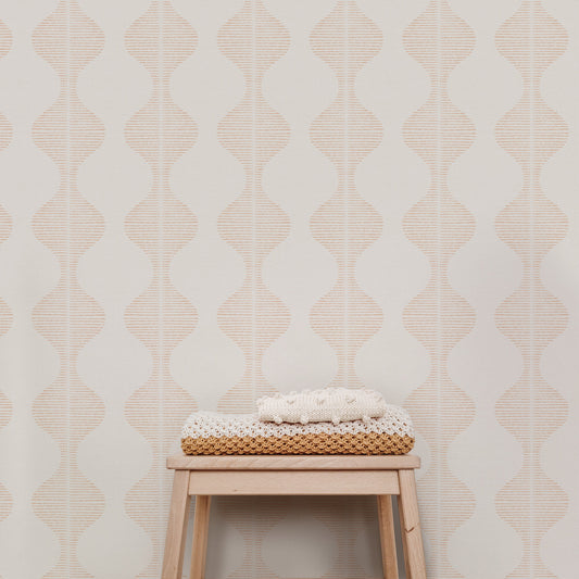 Bring a wave of modern beauty to any room with this stunning Wavy Line Art Wallpaper! The subtle coral on cream design is completely gorgeous and sure to make a statement in any space.