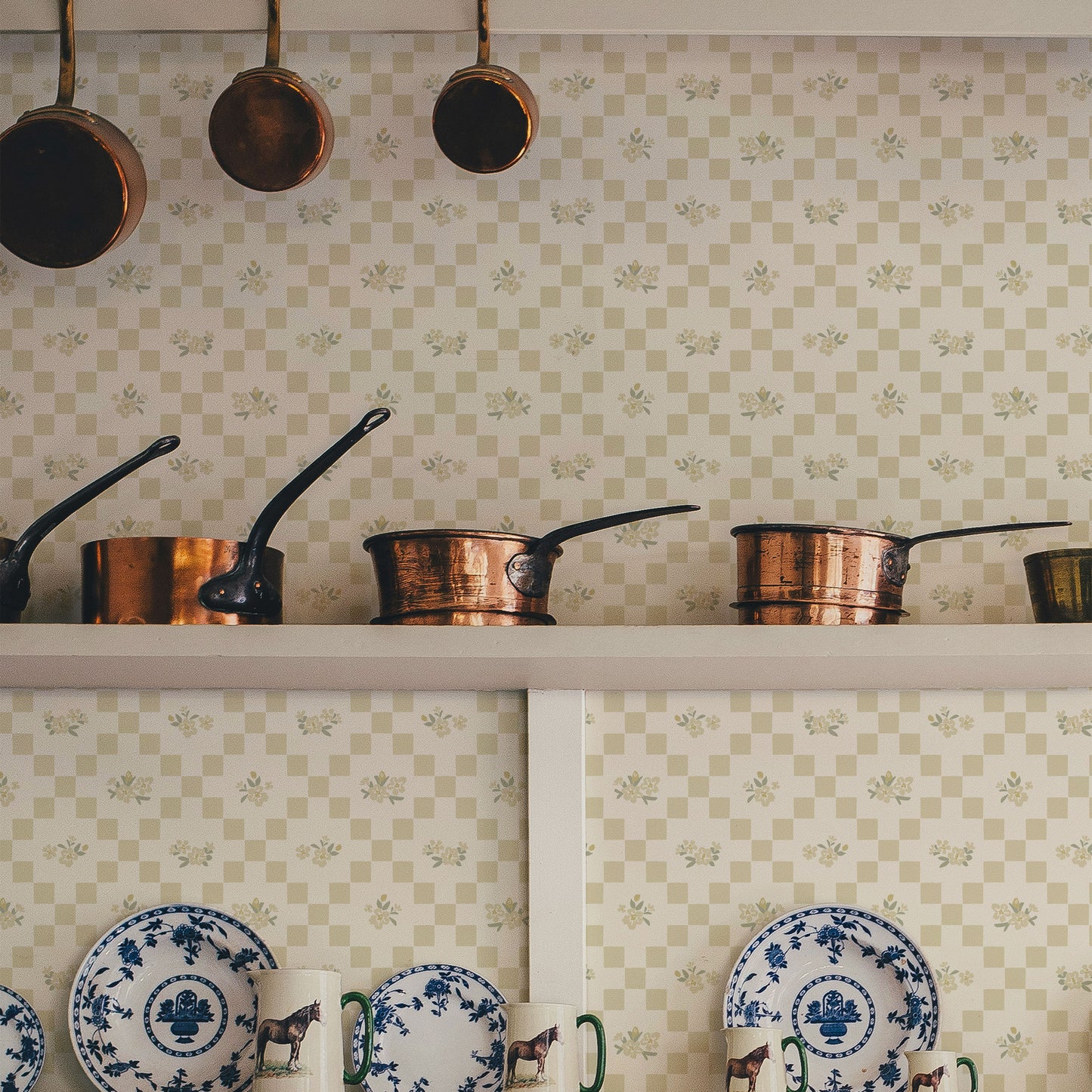 The Vintage Bloom Mosaic wallpaper in Butter cream shown in a kitchen.