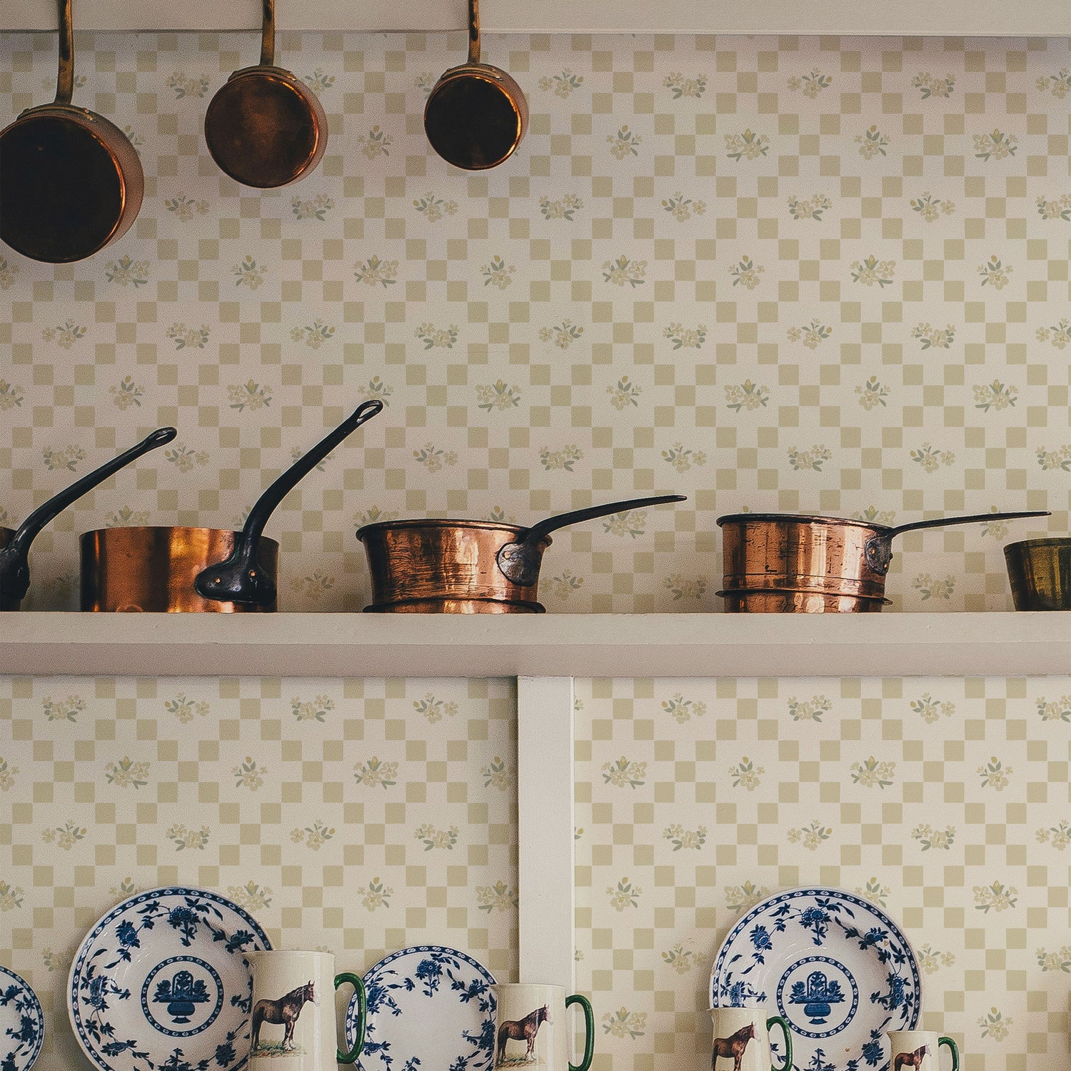 The Vintage Bloom Mosaic wallpaper in Butter cream shown in a kitchen.
