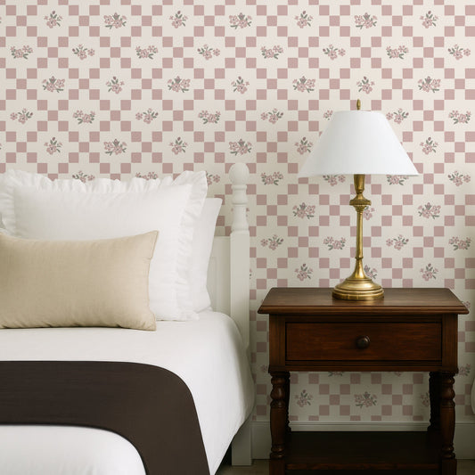Vintage Bloom Mosaic Wallpaper in Dusty Pink shown in a bedroom.