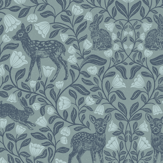 Patterned fabric with deer, rabbits, and flowers on a blue background