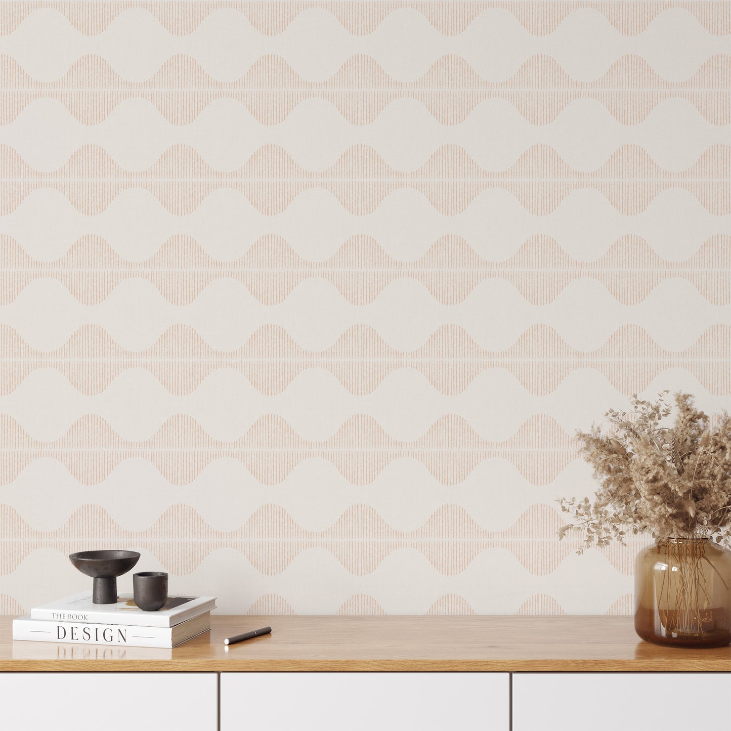 Bring a wave of modern beauty to any room with this stunning Wavy Line Art Wallpaper! The subtle coral on cream design is completely gorgeous and sure to make a statement in any space. 