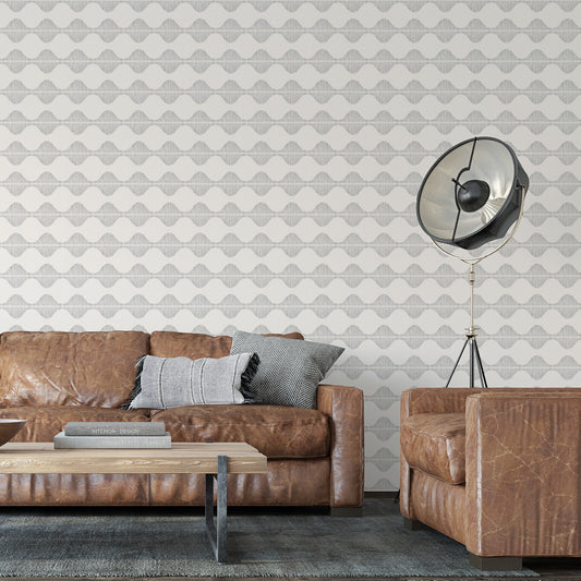 Bring a wave of modern beauty to any room with this stunning Wavy Line Art Wallpaper! The subtle gray on cream design is completely gorgeous and sure to make a statement in any space.