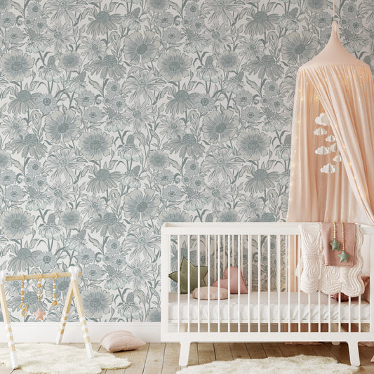 Nursery room with floral wallpaper, crib, and baby toys.
