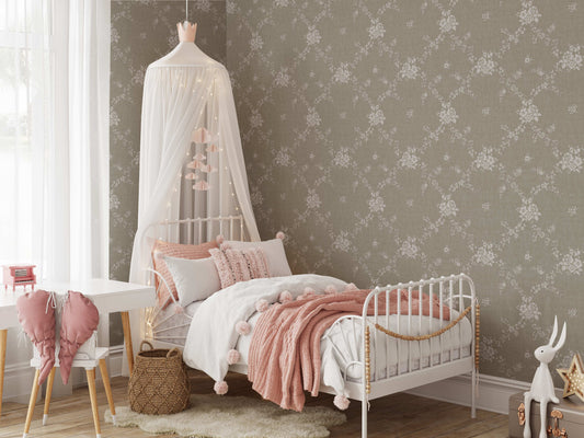 Vining Wild Roses Wallpaper in Sage shown in a bedroom.