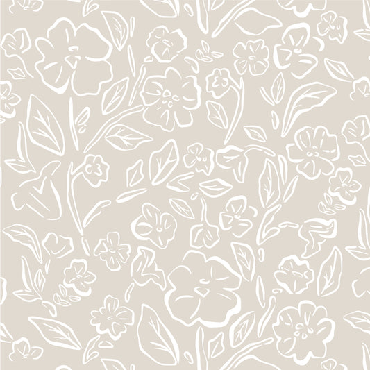 This Beverly Wallpaper in white on taupe offers a stylish and feminine touch with its delicate floral design shown zoomed in.