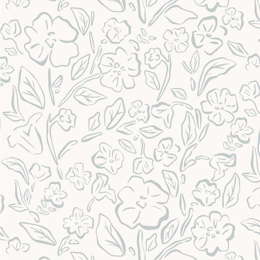 This Beverly Wallpaper in blue offers a stylish and feminine touch with its delicate floral design shown zoomed in.