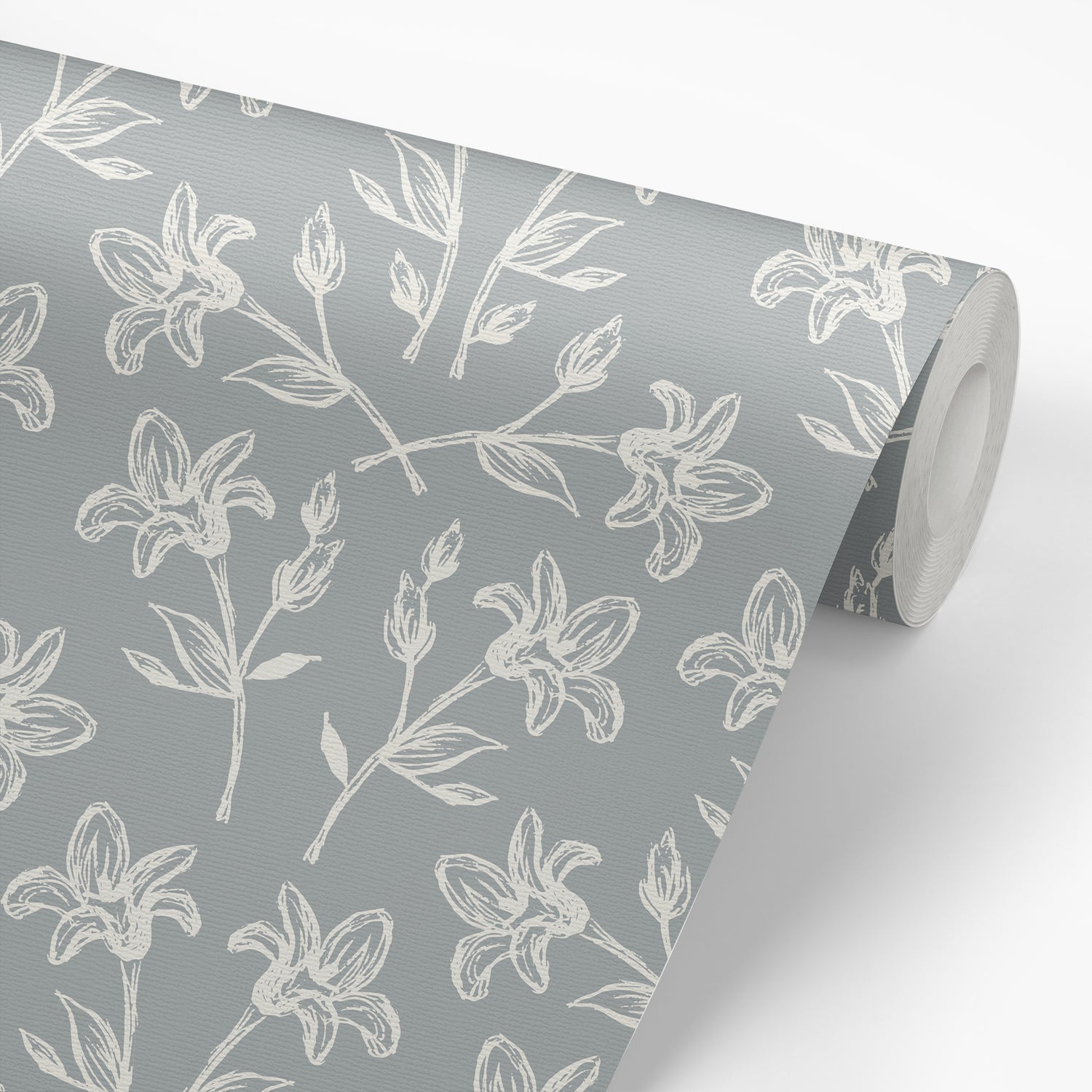 Cottage Florals in Denim shown on a wallpaper roll.