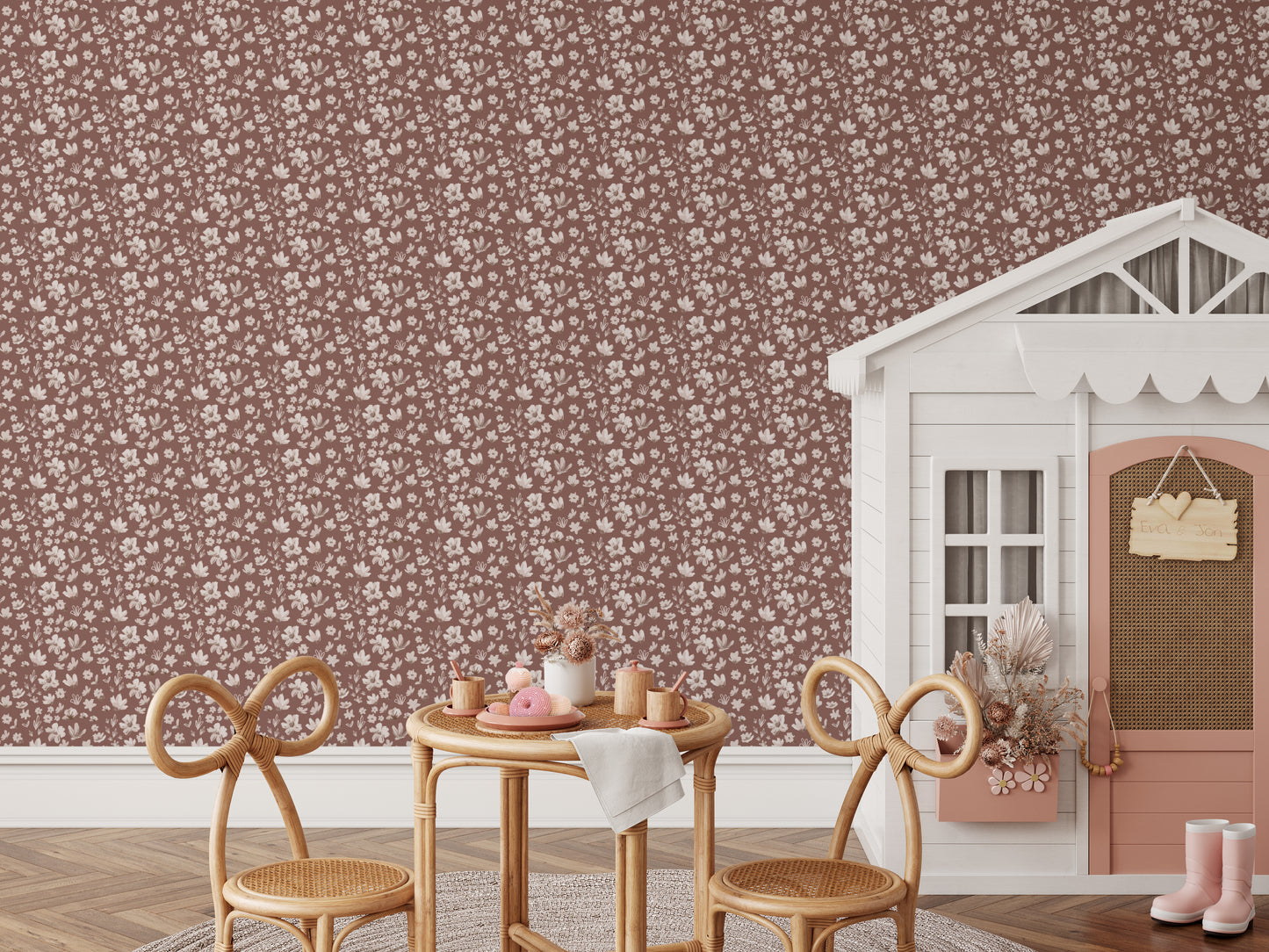 Ditsy Daisies Wallpaper in Rust shown in a playroom.