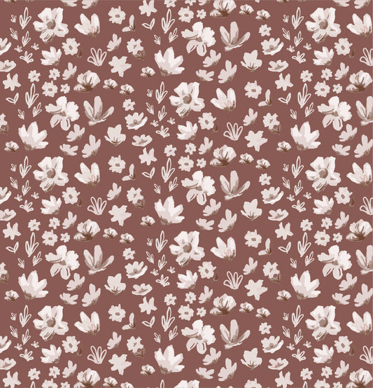 Ditsy Daisies Wallpaper in Rust shown close up.