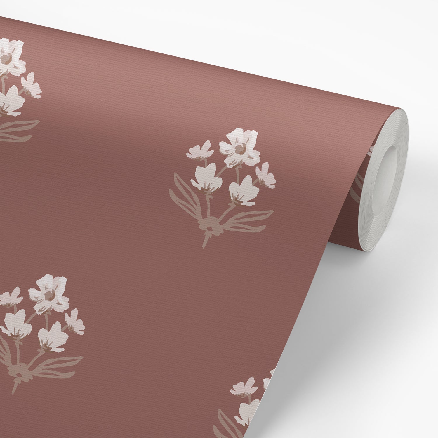 Folk Flowers Wallpaper in Rust shown on a wallpaper roll.