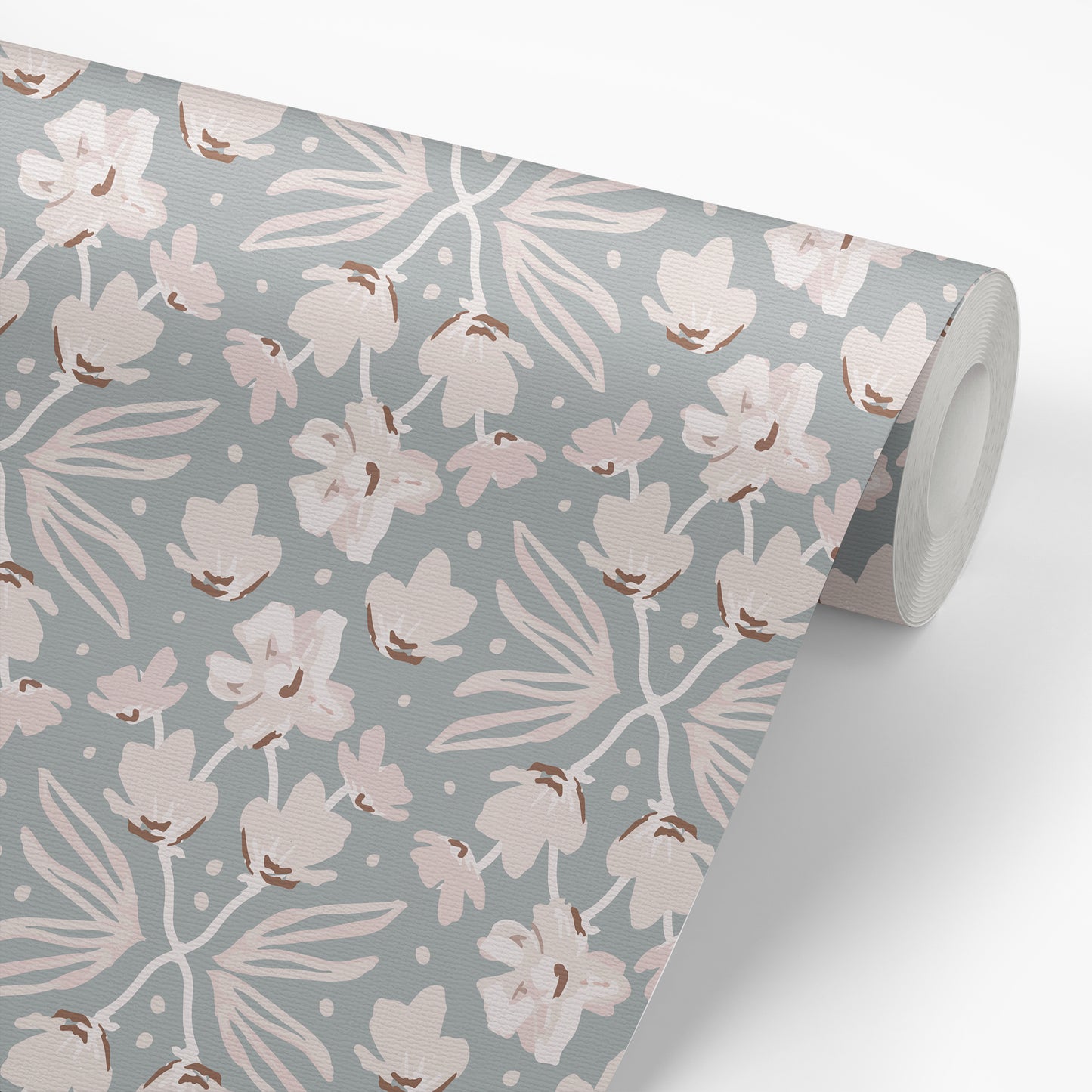 Petite Floral Wallpaper in Denim shown on a wallpaper roll.