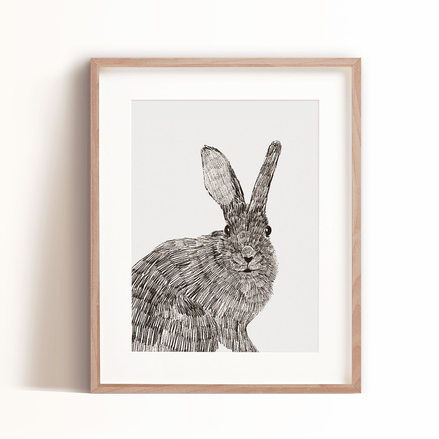 Our Bunny art print's black and white color scheme is the perfect complement to any nursery or kids room.