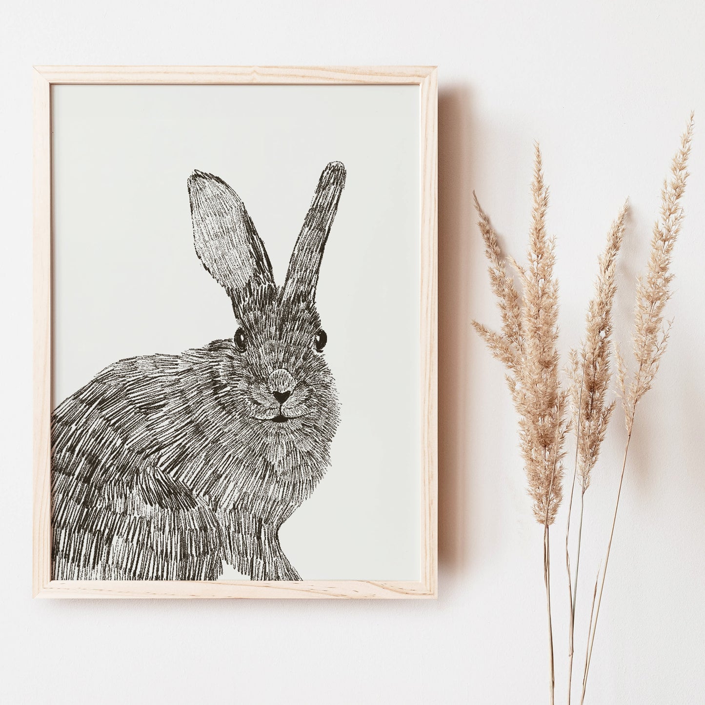 Our Bunny art print's black and white color scheme is the perfect complement to any nursery or kids room.