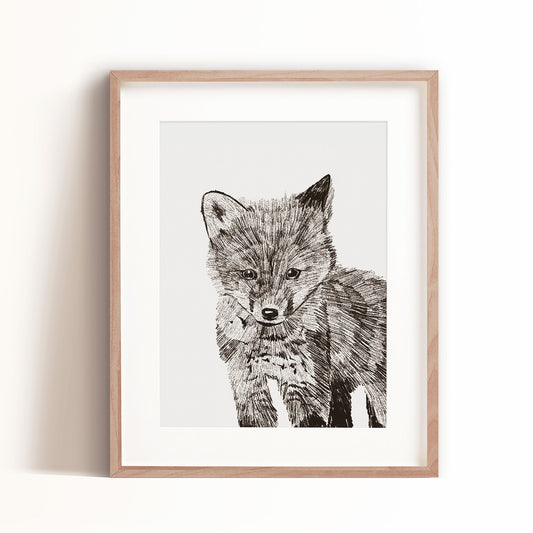This black and white fox art print is a whimsical black and white sketch and one of four woodland animals in this art print collection by Cayla Naylor.