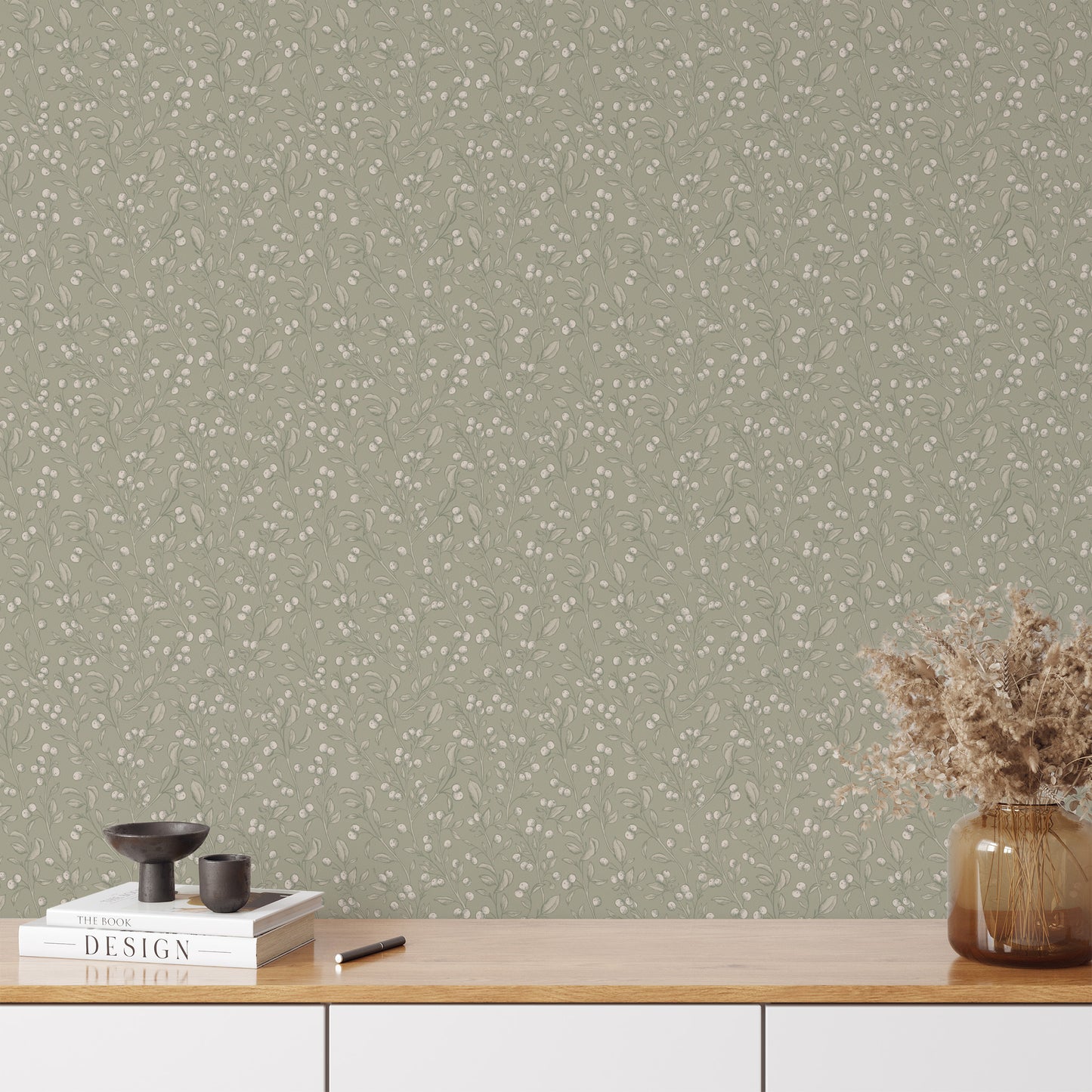 Mockup of our Berries Wallpaper in Dry Sage is a peel and stick, removable wallpaper with hand-drawn sketched berries in dry sage and white by artist Mariah Cottrell.