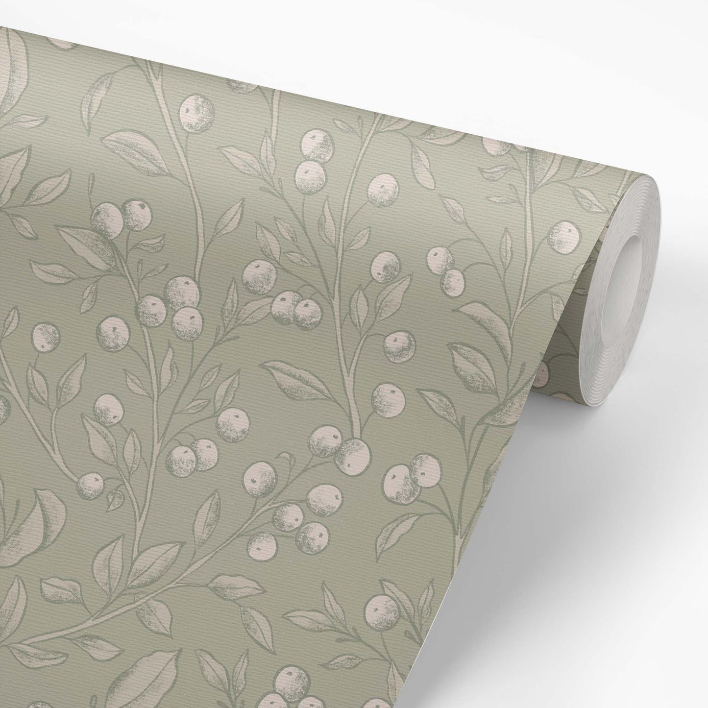 This preview is a wallpaper roll our Berries Wallpaper in Dry Sage is a peel and stick, removable wallpaper with hand-drawn sketched berries in dry sage and white by artist Mariah Cottrell.