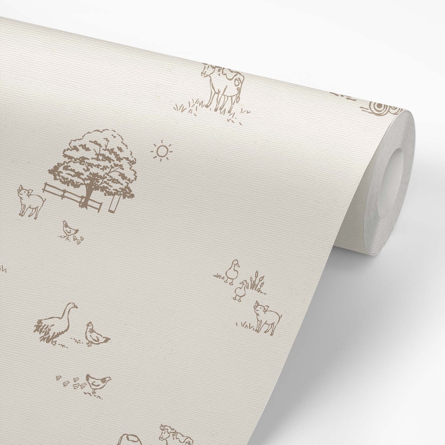 This wallpaper roll shows our Country Farm Wallpaper in Brown. This peel and stick, removable wallpaper was designed by artist Mariah Cottrell and features farm animals and trees in a countryside scene.