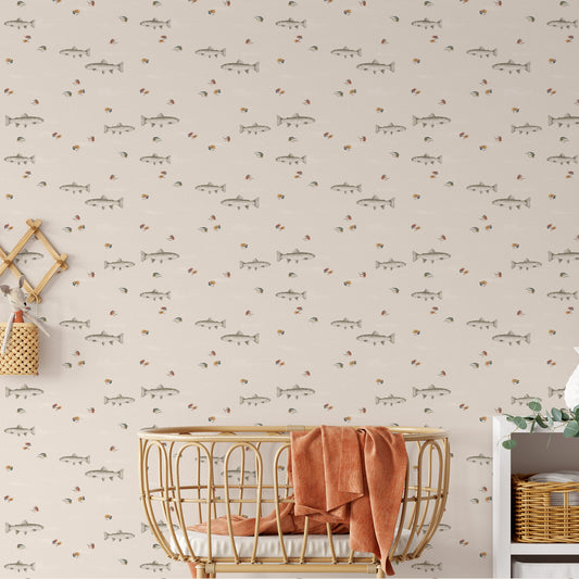 This nursery shows our Fly Fishing Wallpaper in Green. This peel and stick, removable wallpaper was designed by artist Mariah Cottrell and features trout and flies for a calm river scene.