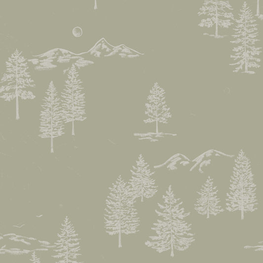 This close up view shows our Mountain Green Wallpaper in Light Green. This peel and stick, removable wallpaper was designed by artist Mariah Cottrell and features beautifully sketched mountains and trees.
