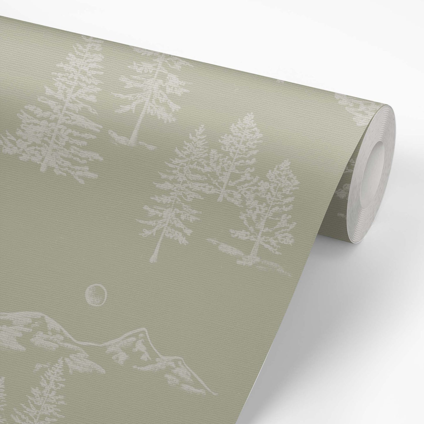 This wallpaper roll shows our Mountain Green Wallpaper in Light Green. This peel and stick, removable wallpaper was designed by artist Mariah Cottrell and features beautifully sketched mountains and trees.