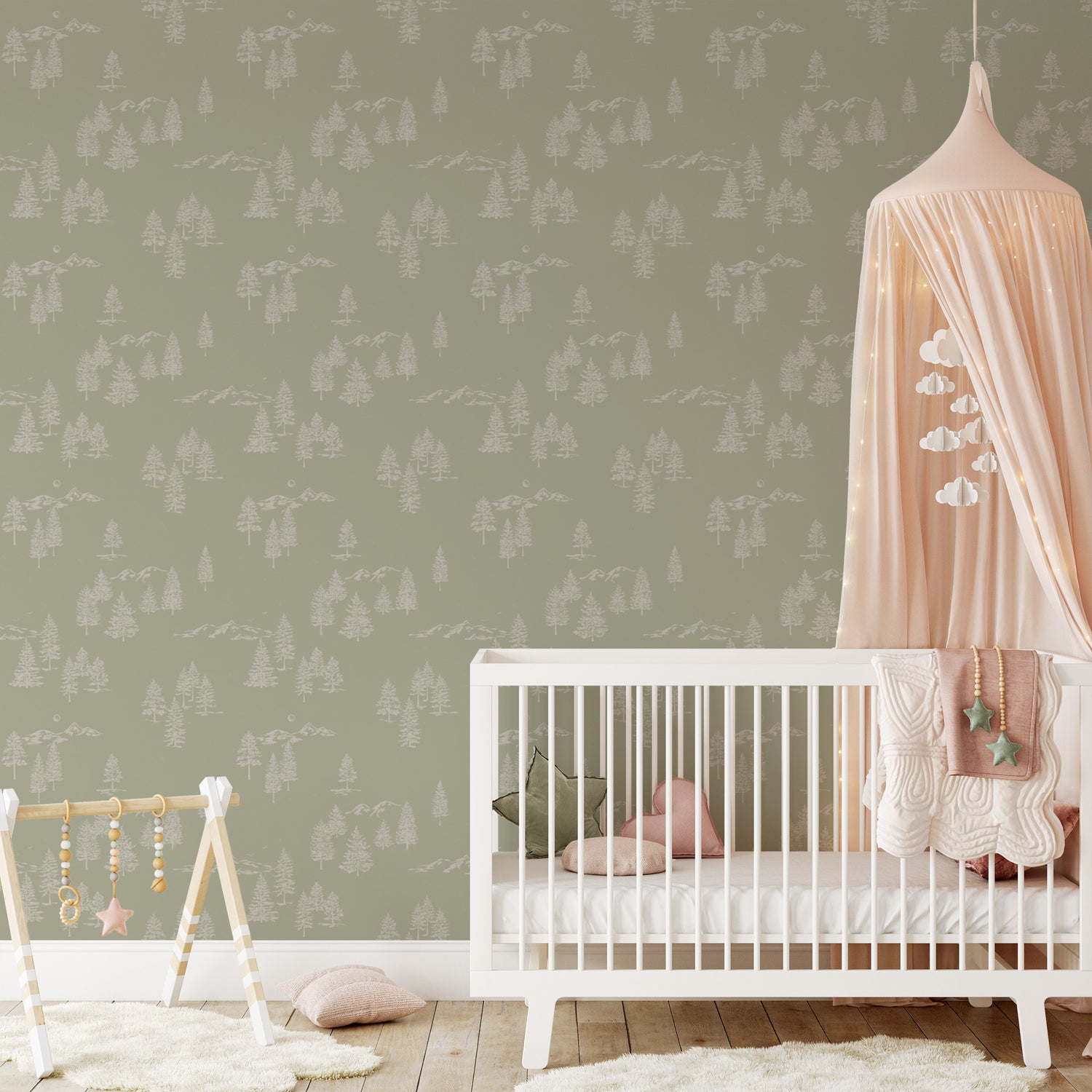 This nursery shows our Mountain Green Wallpaper in Light Green. This peel and stick, removable wallpaper was designed by artist Mariah Cottrell and features beautifully sketched mountains and trees.