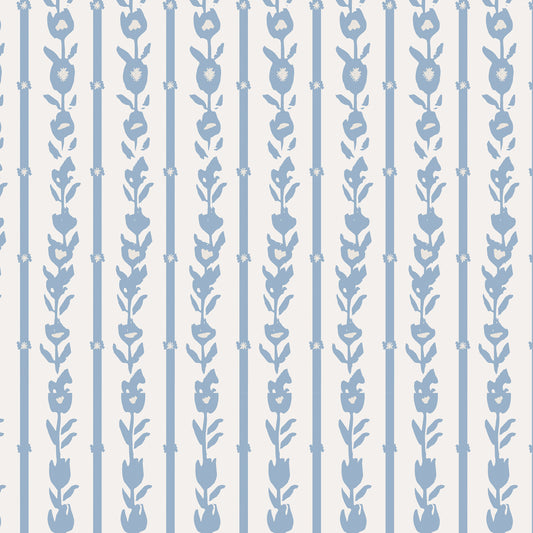 Close up of our oversized floral and stripe Esme peel and stick wallpaper in light blue, grey, and off white by Jackie O'Bosky.