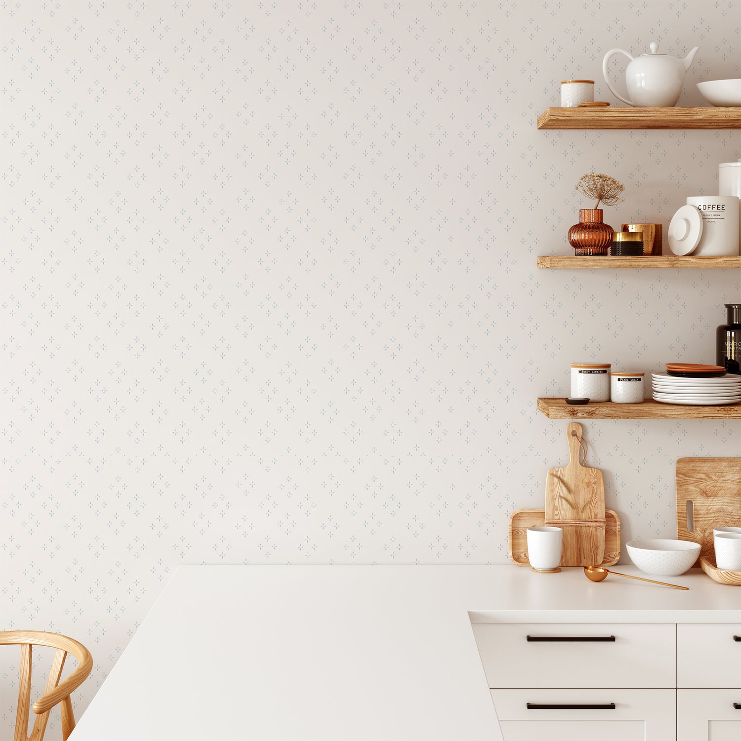 Kitchen wall featuring our diamond and star shaped Isla peel and stick wallpaper by Jackie O'Bosky. This classic pattern is made of blue dots on a creamy white background.
